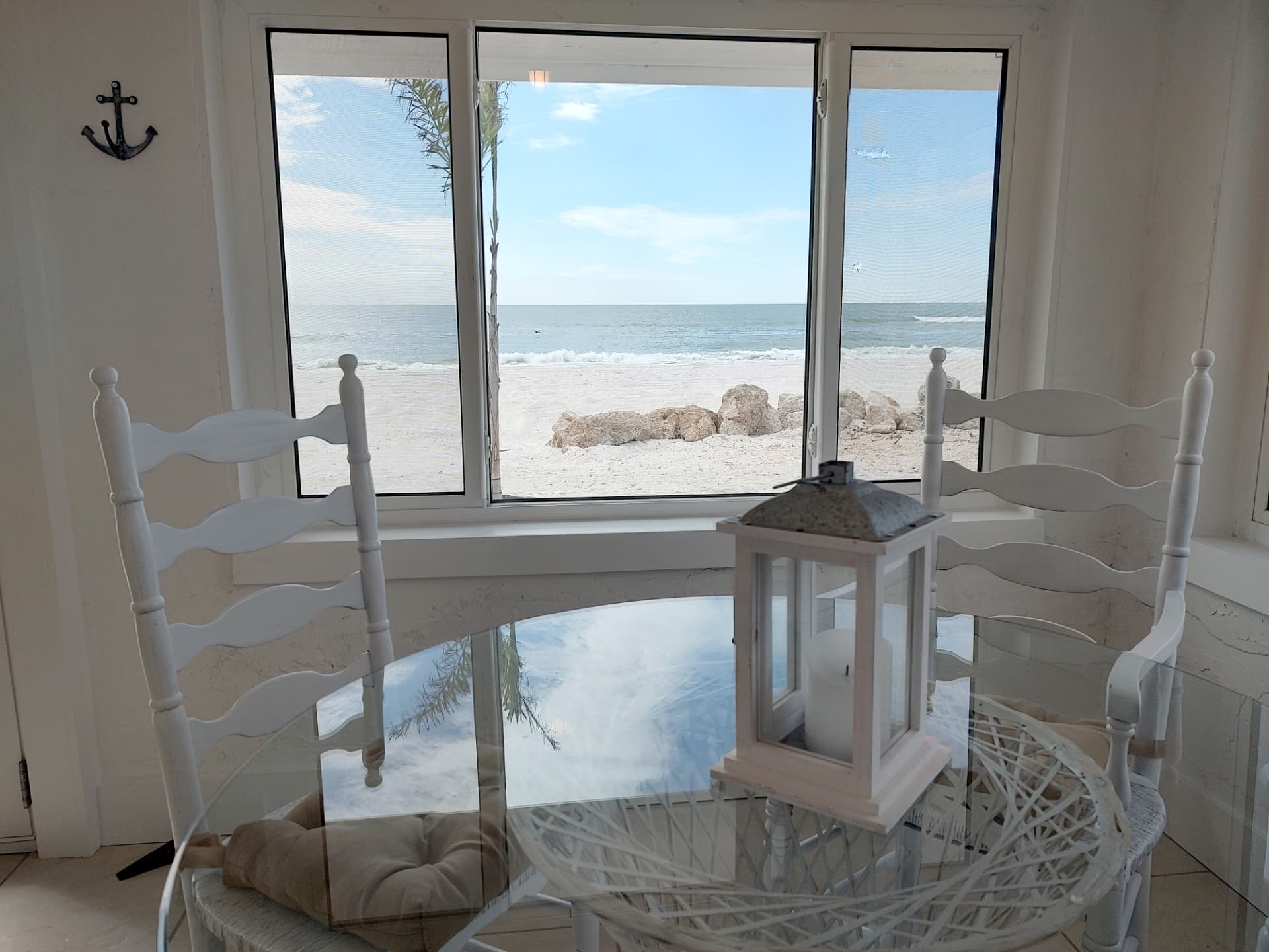 Sun room with a view of the sand