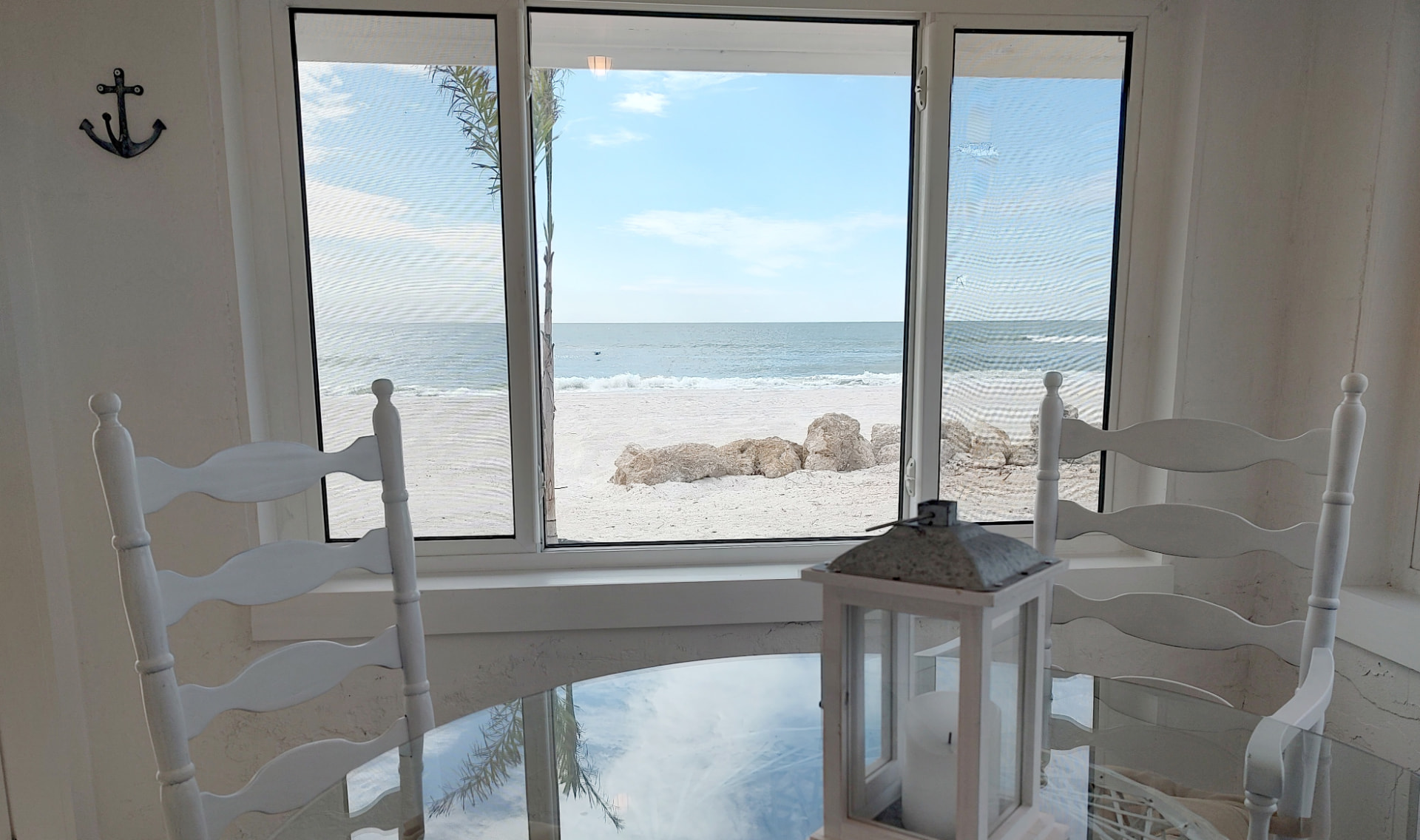 Sun room with a Gulf view in the Sand Dune Bungalow
