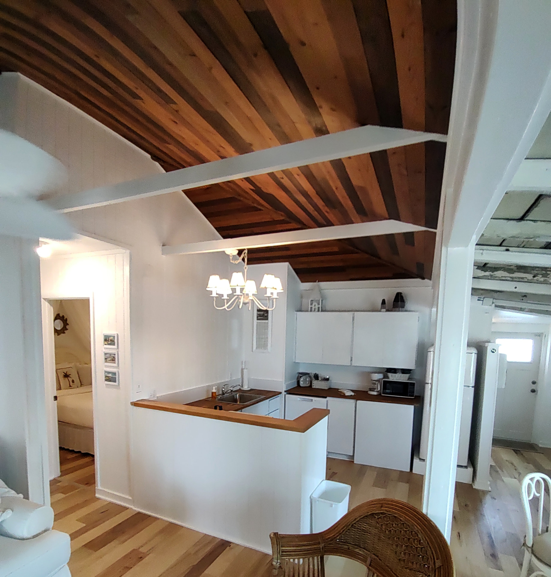 Kitchen and vaulted wood-beam ceiling of the Sand Piper Bungalow